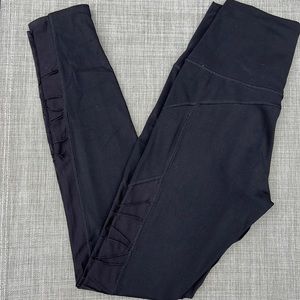 TAVI high waisted leggings in ebony with mesh rushing detail on the sides